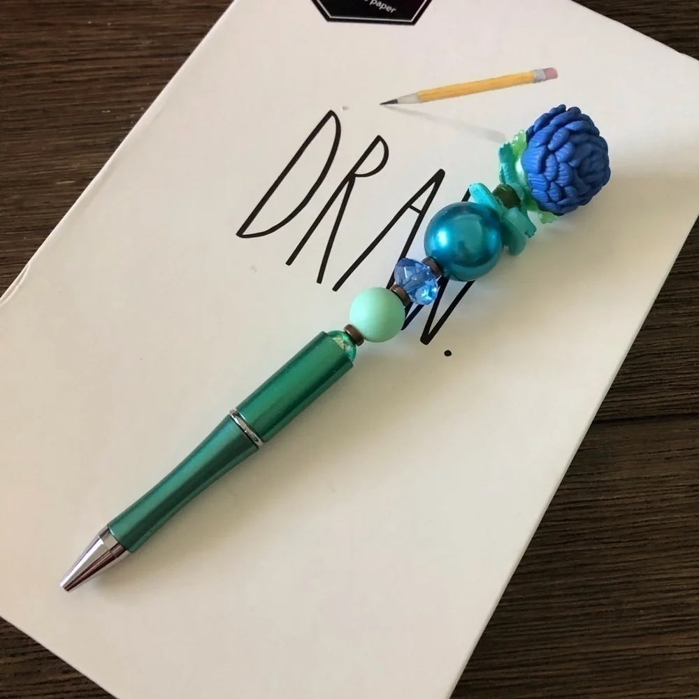 Disney Doorables: Luca: Luca Paguro as sea monster handmade beaded pen